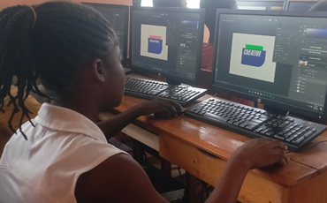 Creative Impact participants working on design tasks