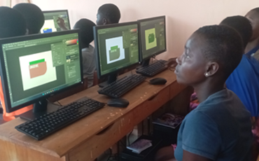 Rural youths learning graphic design at Creative Impact program
