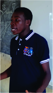 Volunteers assisting students during Rural Tech Hub IT training